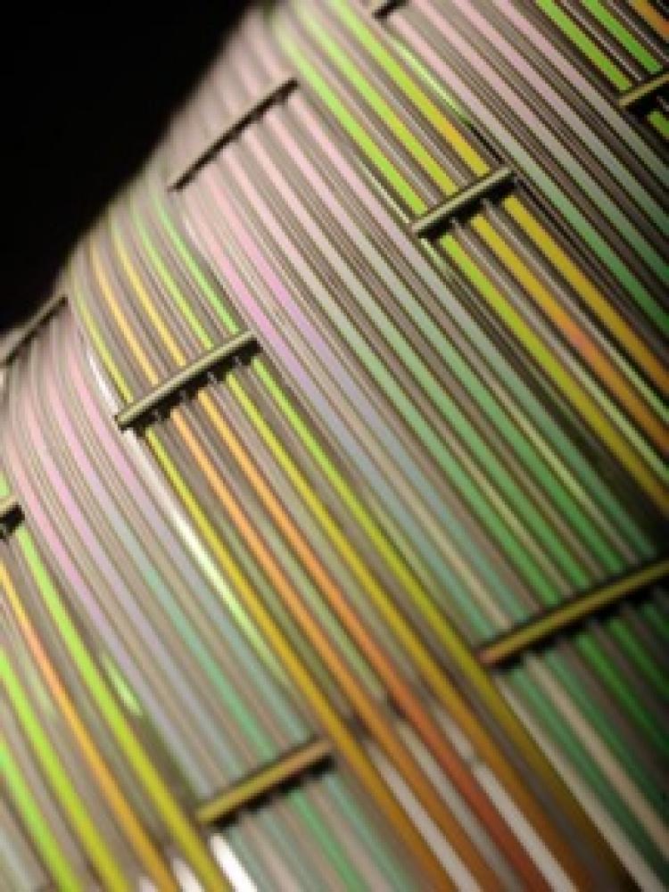 MIT researchers have demonstrated that they can manufacture acoustic fibers with flat surfaces, like those shown here, as well as fibers with circular cross-sections. The flat fibers could prove particularly useful in acoustic imaging devices. (Research Laboratory of Electronics at MIT/Greg Hren)