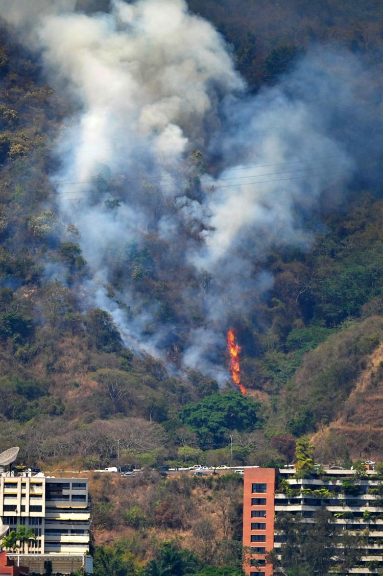 Mt. Avila National Park outside of Caracas, Venezuela is again ablaze. This year's drought has lead to almost constant fires for the last three months. The one shown here is from March 3. (Miguel Gutierrez/AFP/Getty Images)