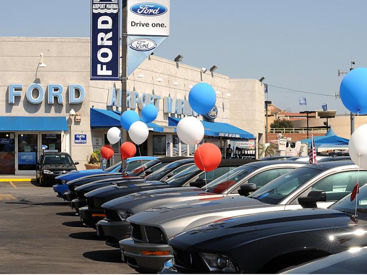 Ford Motor Co. posted an unexpected third-quarter profit, and thinks 2011 will be a profitable year. (Gabriel Bouys/AFP/Getty Images)