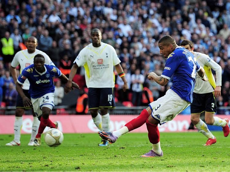 PORTSMOUTH IN FINAL: Kevin-Prince Boateng scores from the penalty spot, assuring his team of a spot in the FA Cup final. (Shaun Botterill/Getty Images)