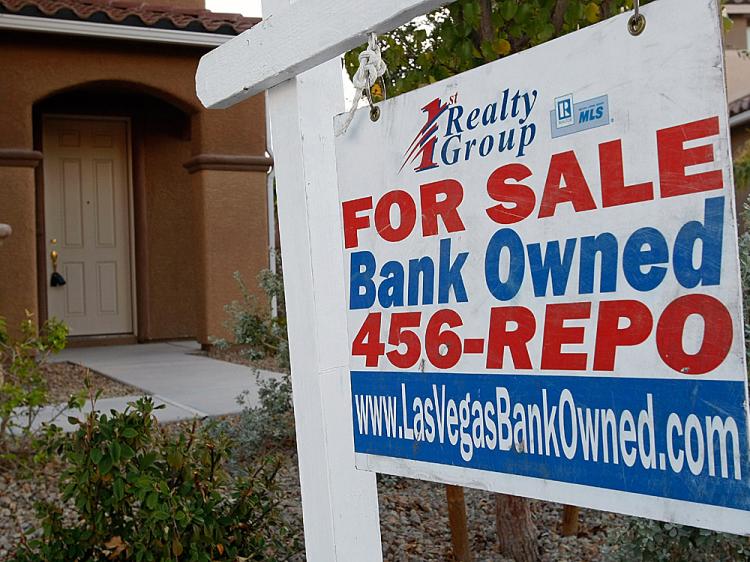 A sign hangs outside a foreclosed home in North Las Vegas, Nevada, where one in every 74 homes is in foreclosure.  (Ethan Miller/Getty Images)