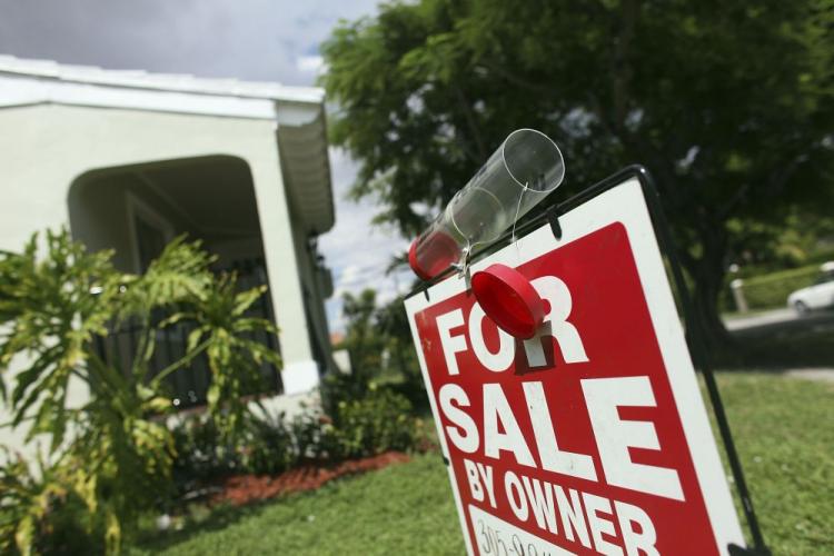 A for sale sign is displayed outside a home in Miami, Florida. Fannie Mae reported a 2009 annual loss of $74.4 billion. (Joe Raedle/Getty Images)