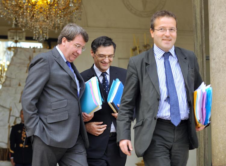 High Commissioner for Active Solidarity Martin Hirsch (R) leaves the Elysee Palace after the weekly cabinet meeting on Sept. 30 in Paris. (Eric Feferberg/AFP/Getty Images)