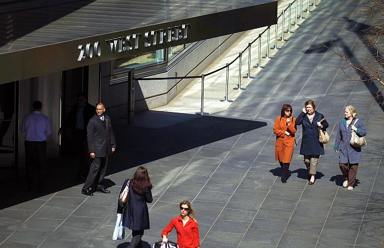 People walk past the Goldman Sachs headquarters