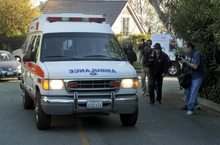 Actress Zsa Zsa Gabor arrives in the back of an ambulance, as she is returned to her home after being discharged from the UCLA hospital, in Bel Air, Los Angeles on August 11, 2010. (Mark Ralston/AFP/Getty Images)