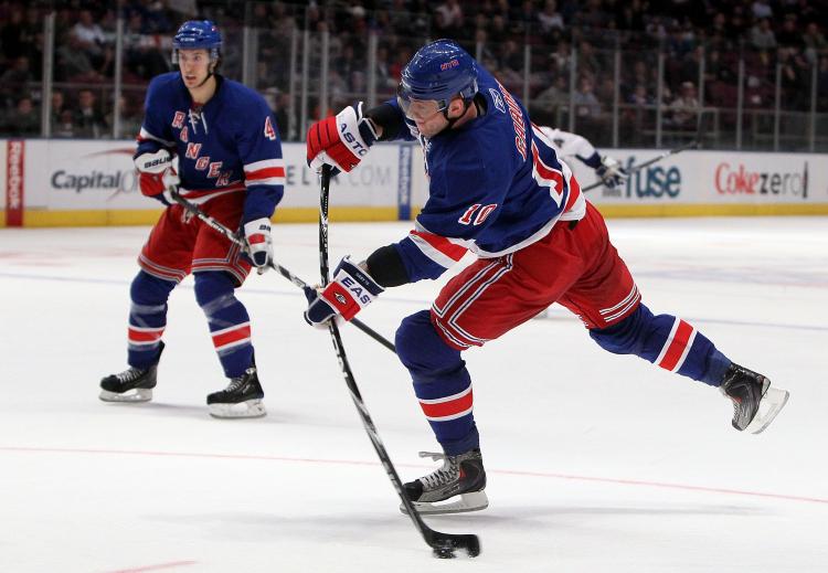 Jim McIsaac/Getty Images (Rangers sniper Marian Gaborik help four of his teammates put the puck in the net on Tuesday at MSG in a big 8-2 win over the Lightning.)