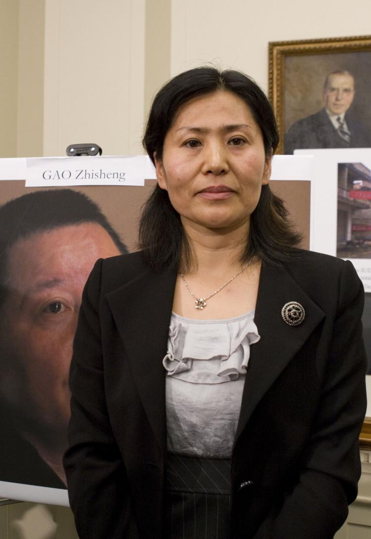 HUSBANDLESS: Geng He, wife of civil rights attorney Gao Zhisheng. Gao has released several letters detailing the torture he was subjected to while in captivity. He is currently being held in extralegal custody, and his whereabouts and welfare are unknown. (Lisa Fan/The Epoch Times)