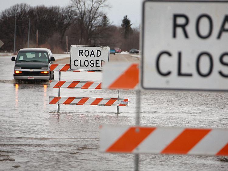 A truck navigates a flooded road near Fargo, North Dakota.   (Scott Olson/Getty Images)