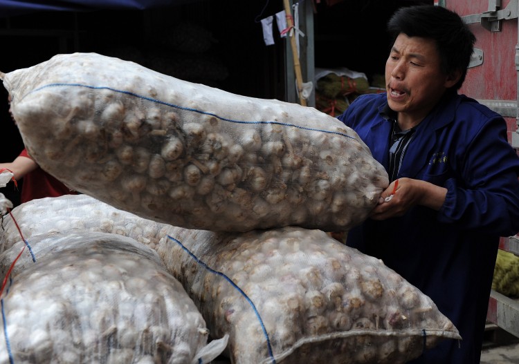 Food prices in China are soaring, but garlic prices have been plummeting. (AFP/AFP/Getty Images)