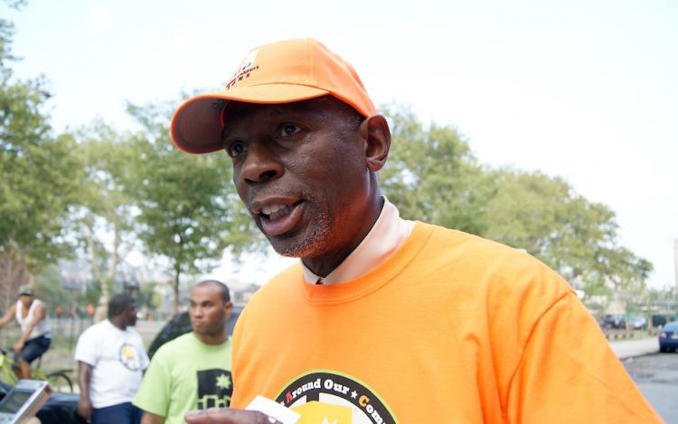 RALLY FOR PEACE: Geoffrey Canada, CEO of Harlem Children's Zone speaks with The Epoch Times at the 16th annual Peace March, held Wednesday, August 11. Over 4,000 children and youth rallied together to call for an end to violence in their community. (Margaret Wollensak/The Epoch Times)