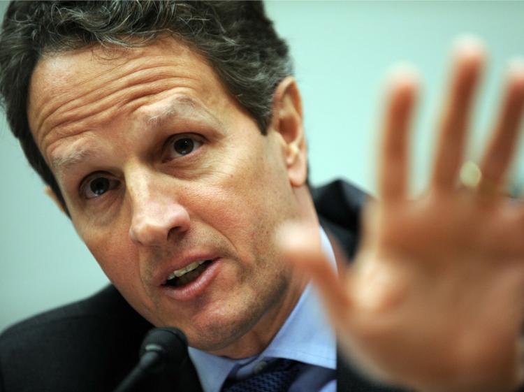 Secretary of Treasury Timothy Geithner is seen at a House Financial Services hearing in Washington last month. Geithner has delayed an April 15 report to Congress on currencies. (Tim Sloan/AFP/Getty Images)