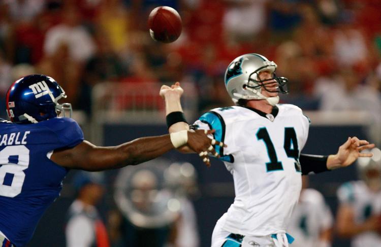 TURNING UP THE HEAT: Giants defensive lineman Leger Douzable #78 was among many backups who stepped up and put pressure on the Carolina Panthers offense during Monday night's preseason opener.  (Jared Wickerham/Getty Images)