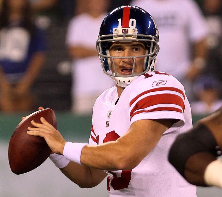 PASSING GRADE: The New York Giants air attack came alive, propelling them to a pre-season victory over the New York Jets. (Nick Laham/Getty Images)