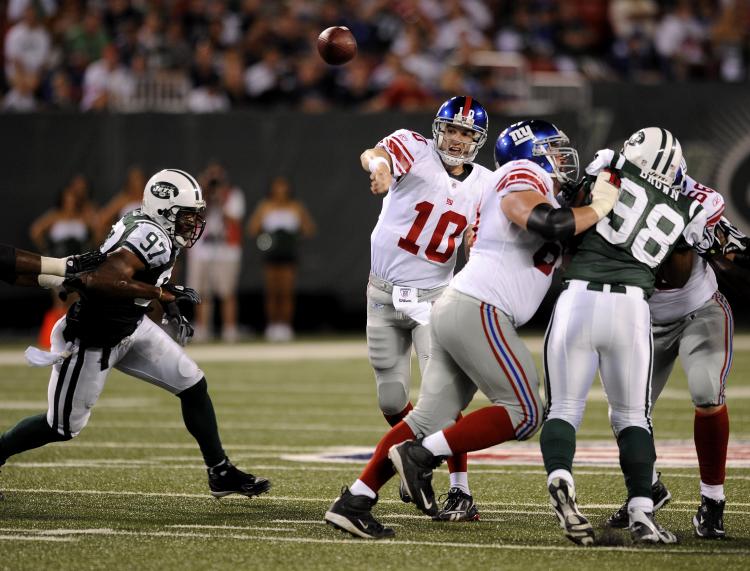 New York's two professional football teams meet in preseason action Saturday night. (Jeff Zelevansky/Getty Images)