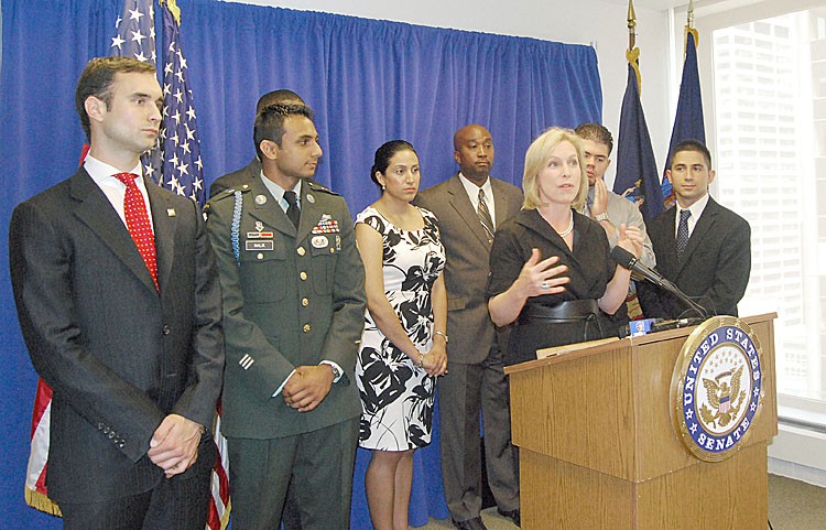 JOBS FOR VETS: Sen. Kristen Gillibrand (C) stands Sunday with young New York City veterans to announce the Hiring Heroes Act of 2011. (Catherine Yang/The Epoch Times)