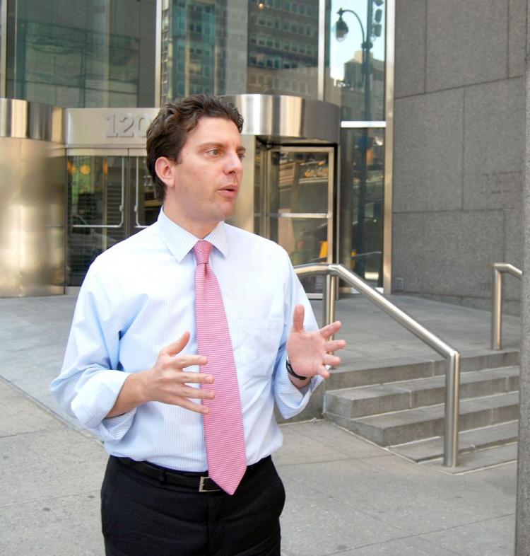 Councilman Eric Gioia (D-Queens) called for New York City to divest its shares from tobacco companies outside a Phillip Morris/Altria building. (Catherine Yang/The Epoch Times)
