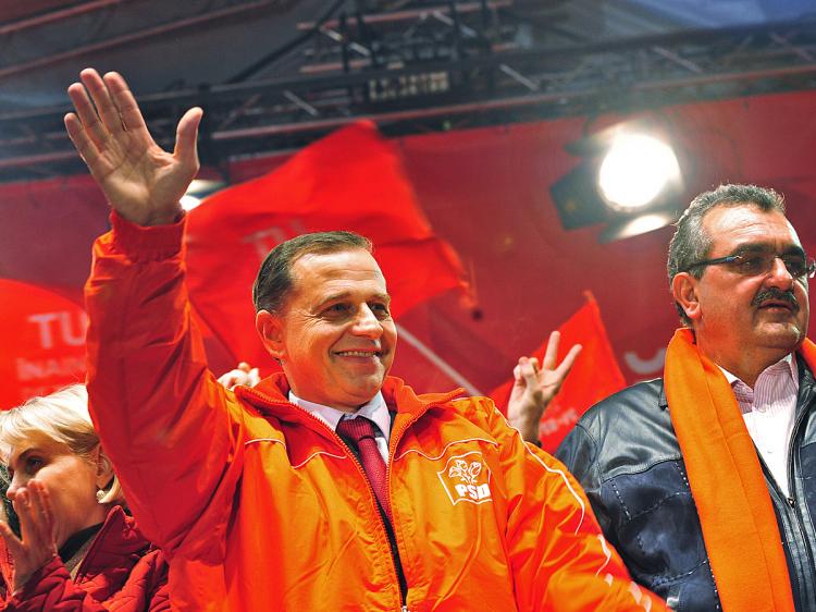 Social Democratic Party (PSD) leader Mircea Geoană celebrates election results shopwing the PSD victory in the Parliamentary elections, at the PSD headquarters, 11-30-08   (Daniel Mihailescu/AFP/Getty Images)