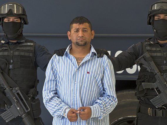 Mexican Federal police personnel escort  David Rosales Guzman, aka 