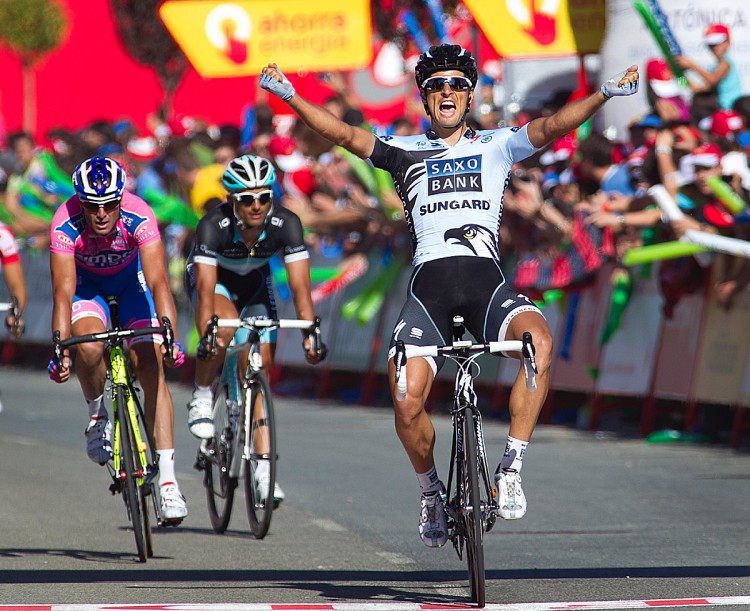 FIRST GRAND TOUR WIN: Juan Jose Haedo of Saxo Bank Sundgard celebrates as he crosses the finish line of Stage 16 of the 2011 Vuelta a España.          (Jaime Reina/AFP/Getty Images)