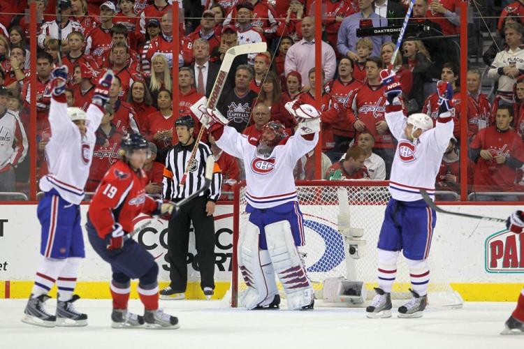 Jaroslav Halak and company celebrate a most improbable result. (Bruce Bennett/Getty Images)