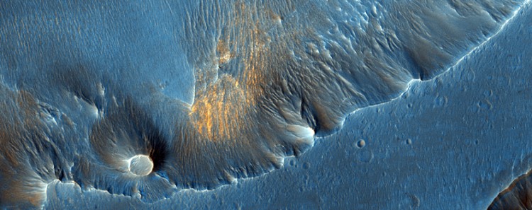 Hematite blueberries on the plains of Capri Chasma, part of the giant Martian system of canyons called Valles Marineris. (NASA/JPL/University of Arizona)