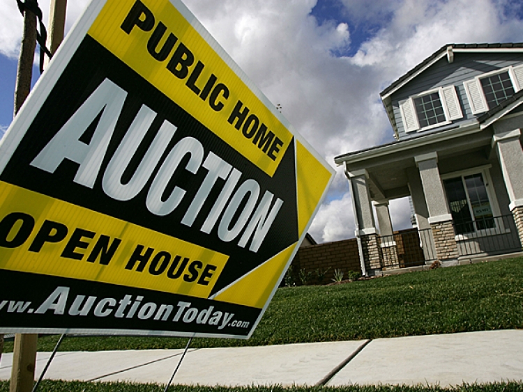 New houses are up for auction in Rancho Cucamonga, California, where a recent housing boom has been taking place January 28, 2008, after new-home sales tumbled to the lowest mark in 12 years during December and prices fell sharply. (David McNew/Getty Images)