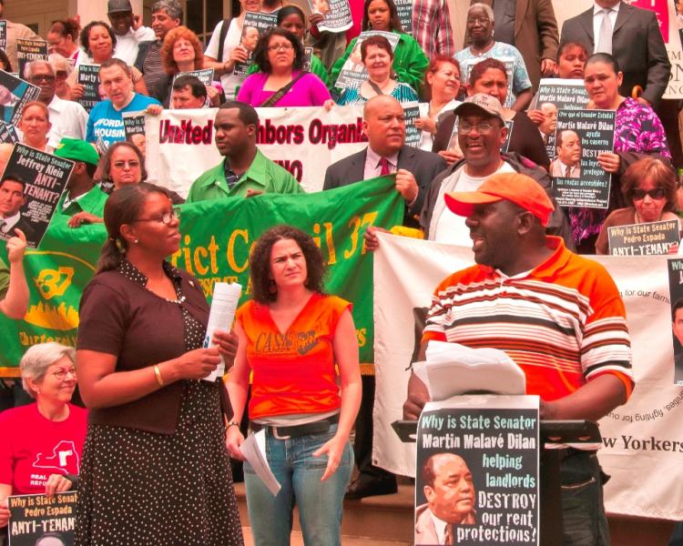 (L-R) City Councilwoman Letitia James, Tamara Czyzyk, tenant advocate who lives in the district of Sen. Espada, and Lee Roy Johnson, a rally speaker.  (Lina Berezovska/The Epoch Times)