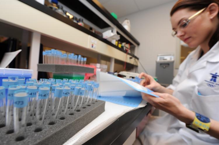 Human growth hormone, in a recent study, was found to aid cystic fibrosis patients. Pictured above, test tubes are prepared for testing for HGH at the Doping Control Laboratory for the 2010 Winter Olympic Games in Vancouver. (Robyn Beck/AFP/Getty Images)