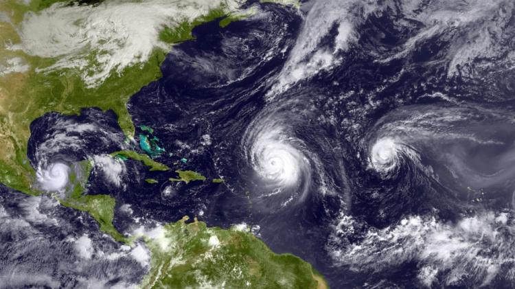 Hurricanes Karl, Julia, and Igor are seen in the Atlantic Ocean September 16, 2010 as seen from space. (NOAA via Getty Images) Hurricanes Karl, Julia, and Igor are seen in the Atlantic Ocean September 16, 2010 as seen from space. (NOAA via Getty Images)