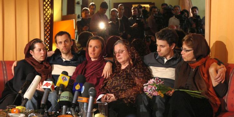 Detained US hikers Shane Bauer (2nd-L), Sarah Shourd (C-L) and Josh Fattal (2nd-R) sit with their mothers during their first meeting since their arrest, in the Iranian capital Tehran on May 20. Iran says the Americans are spies and has suggested that U.S. decide whether it wants a prisoner exchange. (Atta Kenare/AFP/Getty Images)