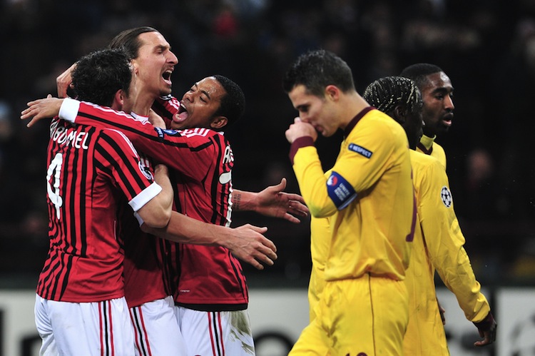 AC Milan's Zlatan Ibrahimovic celebrates his goal in a Champions League hammering of Arsenal on Wednesday in Italy. (Giuseppe Cacace/AFP/Getty Images)