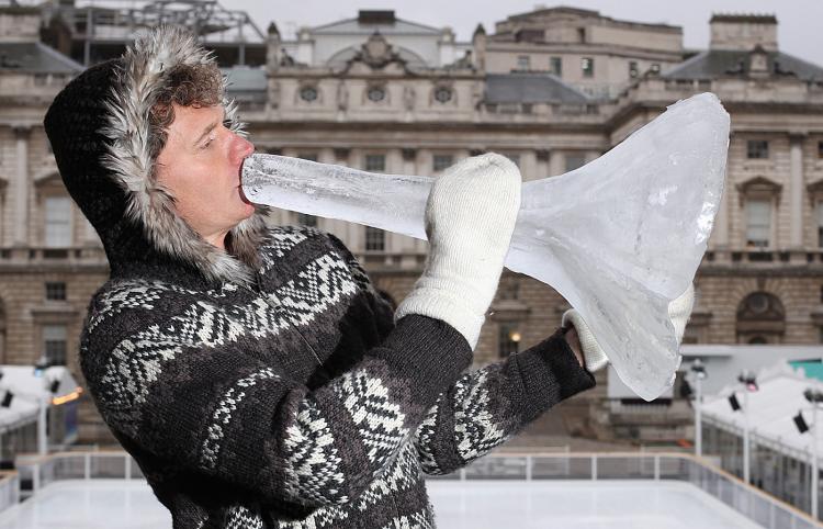 HORN OF ICE: Norwegian composer Terje Isungset plays a horn made from ice at Somerset House on Jan. 6 in London. (Dan Kitwood/Getty Images)