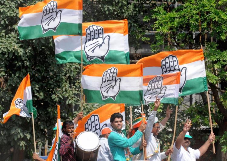 Indian Congress Party workers celebrate their election victory in New Delhi on May 16, 2009. (Prakash Singh/AFP/Getty Images)