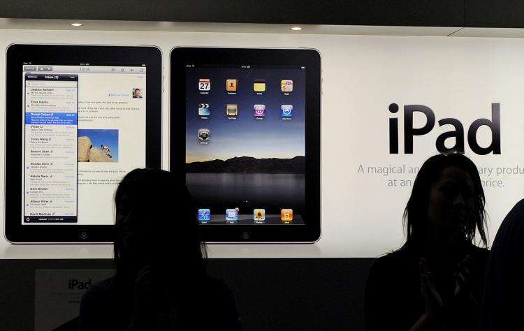 The Australian launch of the iPad inside Apple's flagship store in Sydney on May 28. Walmart announced recently that they are selling the iPhone for over $100 less the retail price and now they will be selling the iPad. (Greg Wood/Getty Images)