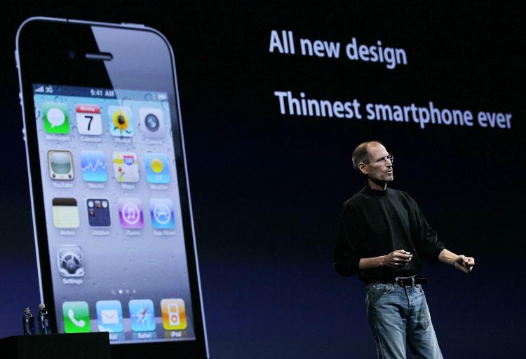 Apple CEO Steve Jobs announces the new iPhone 4 at the 2010 Apple World Wide Developers conference June 7, in San Fran California. Jobs kicked off their annual WWDC with the announcement of the new iPhone 4.  (Justin Sullivan/Getty Images)