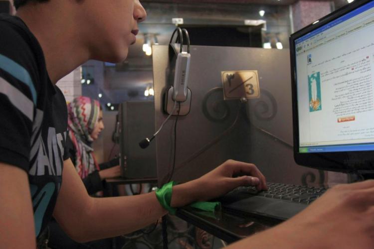 An Iranian youth at an internet cafe in the city of Hamadan, Iran. Software designed to allow Iranians to circumvent government monitoring of Internet traffic in Iran has been withdrawn amid security fears. (Nima Daymari/AFP/Getty Images)
