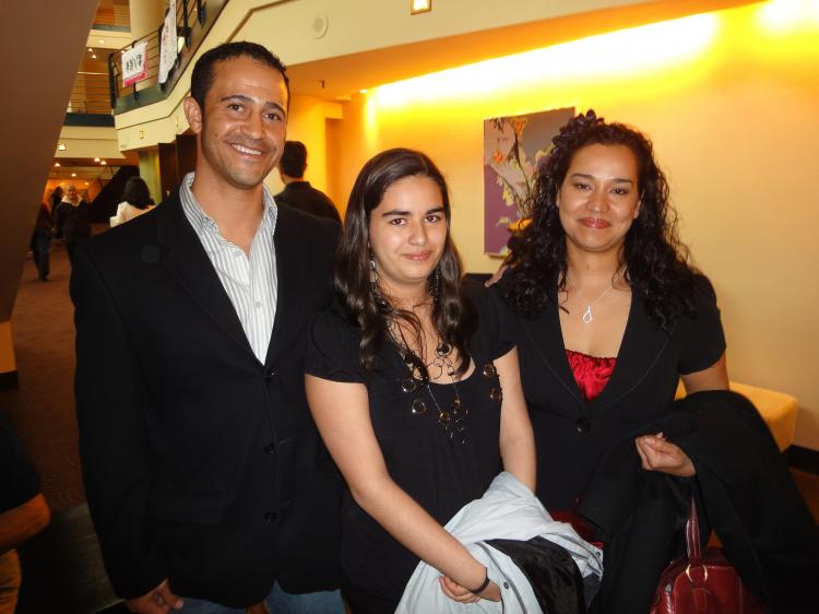 Business owner Isaac Butler, with his daughter Adrianna, and his wife Brandy at the Shen Yun performing arts show at the Buell Theater in in Denver. (Cary Dunst/ Epoch Times Staff )