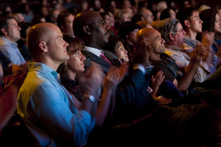 Audience members are fascinated by the DPA show in Jacksonville.  (The Epoch Times)