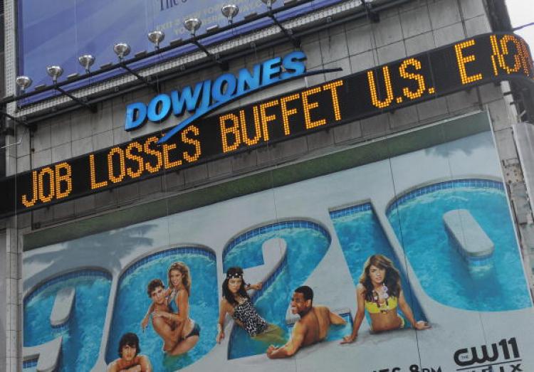 A news ticker displays the latest financial news in New York's Times Square on Oct. 27, 2008.  (Stan Honda/AFP/Getty Images)