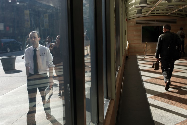 VANISHING JOBS? Hundreds of people looking for employment wait in line outside at an AARP job fair in New York in this file photo. The unemployment rate in the United States still hovers around 9.1 percent. (Spencer Platt/Getty Images)