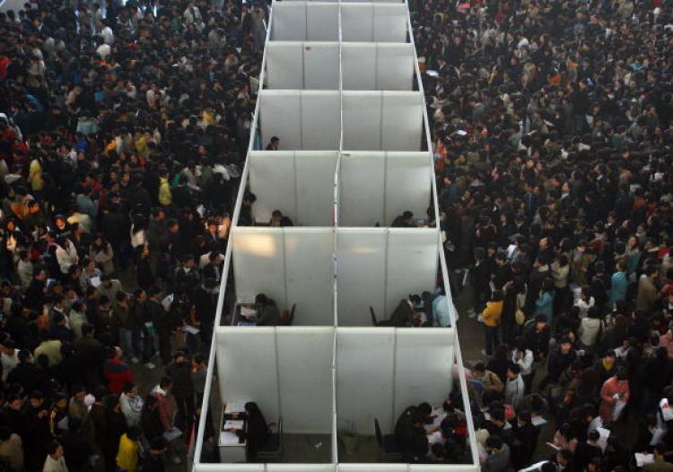 A job fair on Nov. 20 in Nanjing, capital of Jiansu Province, was crowded with college graduates seeking employment. (Getty Images)