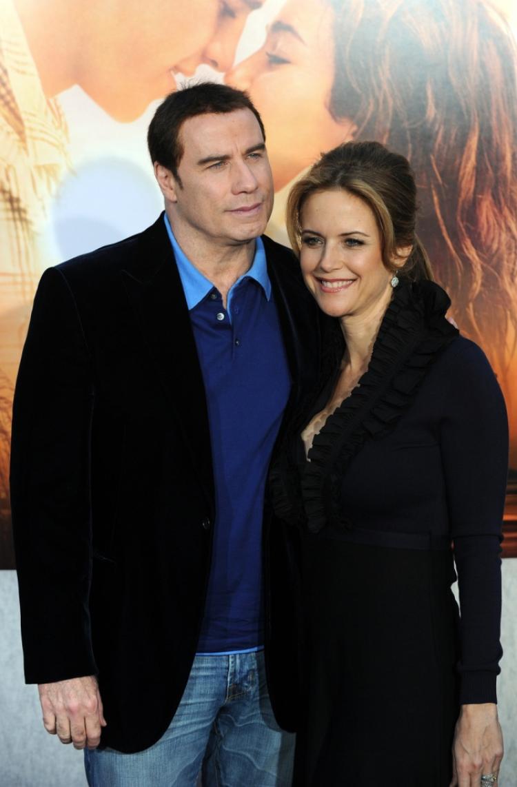 John Travolta and Kelly Preston announced this week they are expecting a baby son in November. (Gabriel Buoys/AFP/Getty Images)