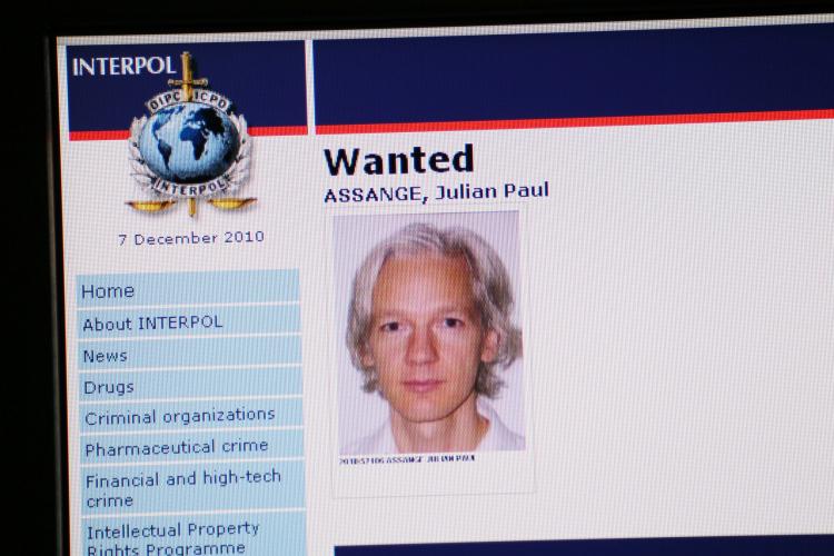 Julian Assange's portrait on Interpol's website. Assange, Wikileaks' founder, was arrested in London on Tuesday and appeared at Westminster Magistrate's Court hours later, and is expected to fight attempts to extradite him to Sweden. (THOMAS COEX/AFP/Getty Images)