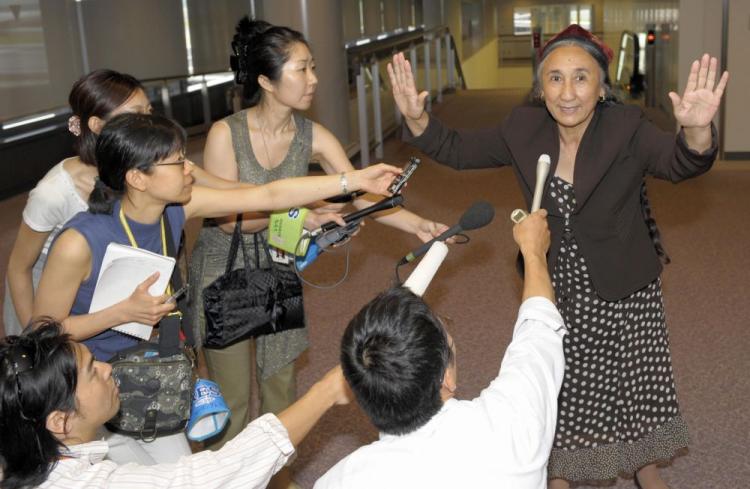 President of the World Uyghur Congress, Rebiya Kadeer (R) arriving in Tokyo on her way to Australia to speak at the Melbourne International Film Festival (MIFF). Pressure from the Chinese Consulate to remove a documentary about her life from the Festival program failed but the actions have raised concerns about freedom of speech. (Toshifumi Kitamura/AFP/Getty Images)