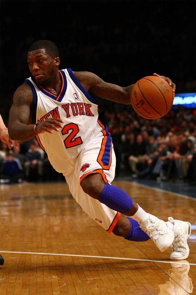 PLAYING BIG: Nate Robinson may be small in stature but his big plays on Monday led the Knicks over the Pistons 99󈟇. (Chris McGrath/Getty Images)