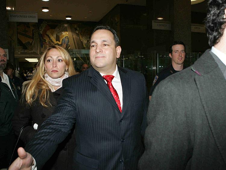 New York State Sen. Hiram Monserrate (C) leaves Kew Gardens court after the verdict in his assault case October 15, 2009 in the Kew Gardens neighborhood of the Queens borough of New York City. Sen. Monserrate was found guilty of misdemeanor assault for cu (Ellis Kaplan/Getty Images)