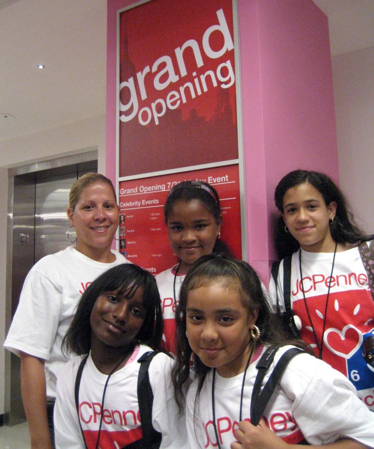 NEW RETAIL: Young girls in the ChildrenÃ¢ï¿½ï¿½s Aid SocietyÃ¢ï¿½ï¿½s afterschool programs accompanied by Program Director Debbie Torres (L), happy to be on a shopping spree.  (Vicky Jiang/The Epoch Times)