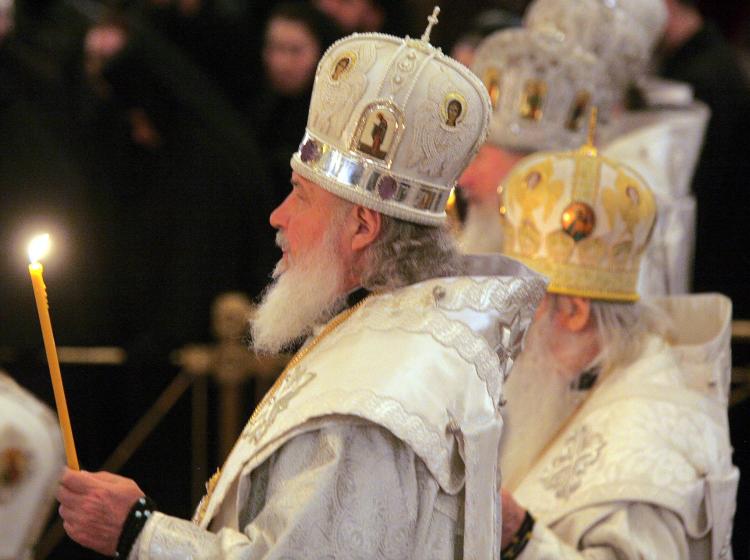 Metropolitan Kirill holds a candle during a farewell ceremony for the late Patriarch Alexy II, the head of the Russian Orthodox Church, in Christ the Savior Cathedral in Moscow, on Dec. 6. (Dmitry Kostyukov/AFP/Getty Images)