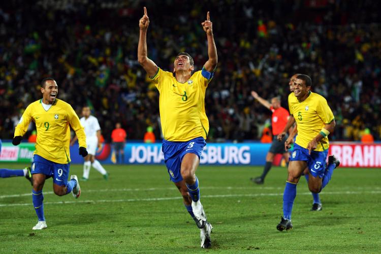 CAPTAIN COMEBACK: Lucio (center) celebrates the Confederations Cup-winning goal on Sunday in Johannesburg, South Africa against the U.S. (Alex Livesey/Getty Images)