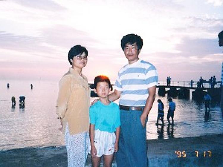 Ms. Wang Sanying and her family (Clearwisdom.net)